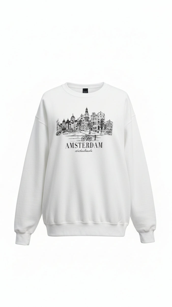 A white crewneck sweatshirt. The sweatshirt features a black line art graphic of the Amsterdam skyline with the word Amsterdam