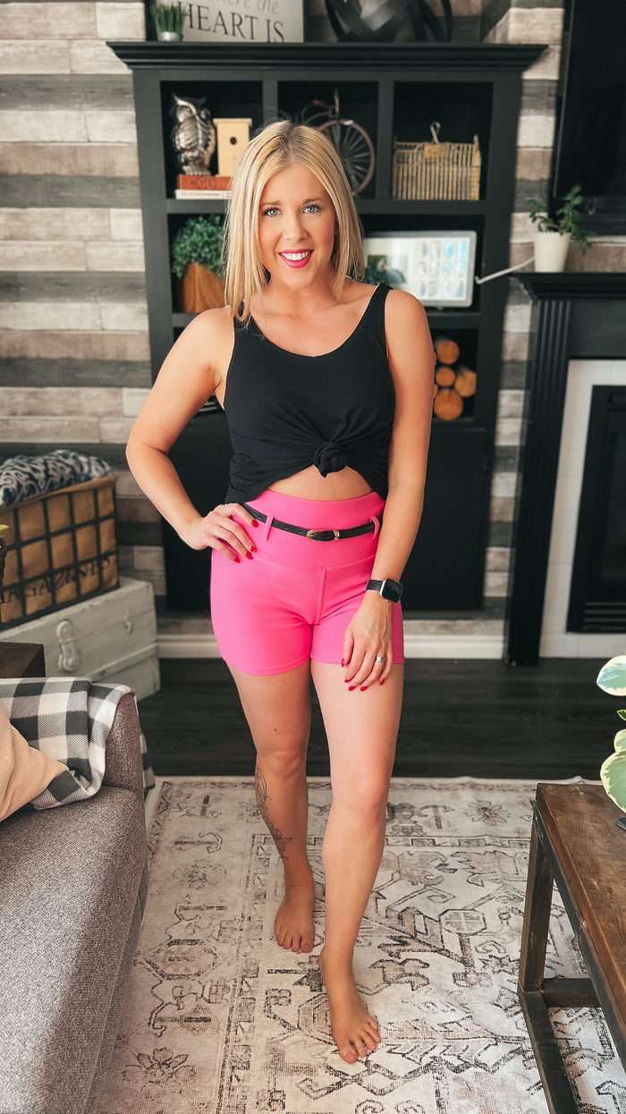 Hot pink stretchy shorts with belt