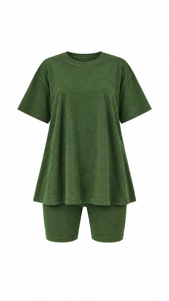 A matching two-piece lounge set consisting of an oversized short-sleeve top and coordinating shorts in olive green