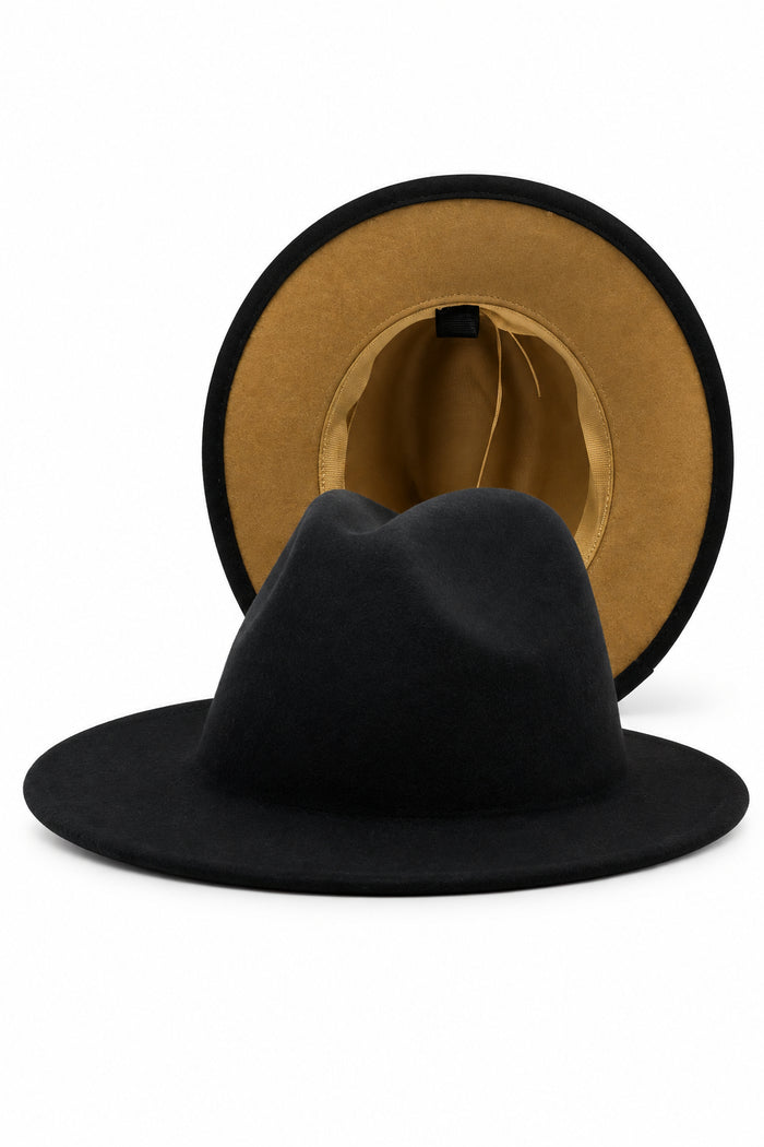 A black felt wide-brim hat.  The hat has a black crown and brim with a warm tan or khaki-colored inside