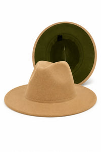 A tan wide-brim fedora hat with the inside being an olive green
